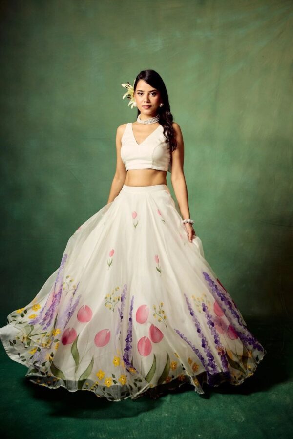 Premium Taby Silk Floral Print Lehenga Set with Organza Dupatta | Jazz & Co. Closet Collection 🌸 Price: [Insert Your Price] (Shipping Extra) Availability: Semi-Stitched Lehenga up to XXL Product Description: Elevate your ethnic wardrobe with this Premium Floral Lehenga Set from the Jazz & Co. closet collection. Designed with rich Taby Silk, this outfit blends feminine elegance and contemporary style, making it a must-have for festive and party wear. 💃 Lehenga (Semi-Stitched) • Fabric: Premium Taby Silk • Design: Beautiful All-over Floral Print • Flair: 3.5 Meters • Features: Heavy Cancan with Inner Covering • Stitching: Semi-Stitched (Fits up to XXL) 👚 Blouse (Unstitched) • Fabric: Premium Silk • Style: Unstitched – Customize as per your fit 🧣 Dupatta • Fabric: Premium Taby Organza Silk • Design: Matching Floral Print • Length: 2.5 Meters ✨ Product Highlights: • Showroom Finishing • Premium Quality Fabric & Print • Heavy Cancan for Grand Volume 📦 Package Includes: Semi-Stitched Lehenga, Unstitched Blouse, Floral Organza Dupatta 💼 From the Jazz & Co. jazz collection – a refined take on traditional charm.